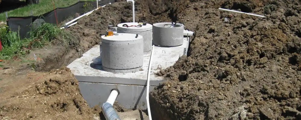 Septic system repair and installation site with tank access ports in Saint Petersburg, FL