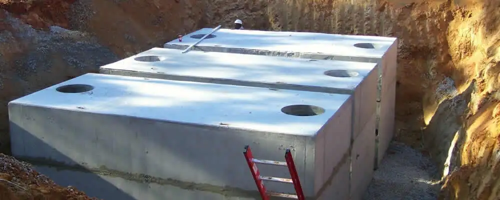 Septic tank installation site with a newly placed concrete tank in Saint Petersburg, FL